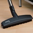 The Miele Compact C1 Turbo Team comes with a hardwood floorhead that effectively cleans hardwood floors